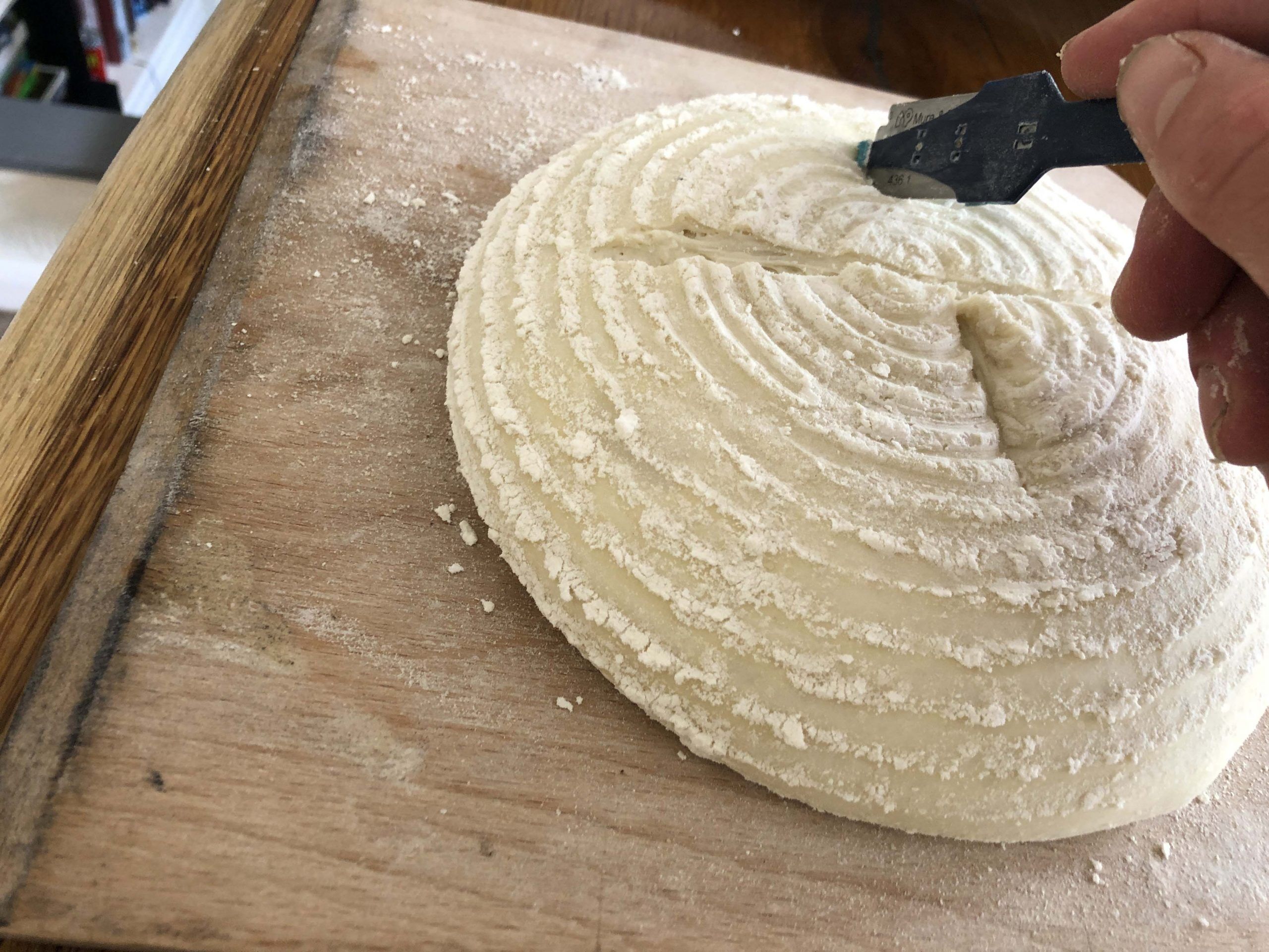 fourth cut of sourdough turn the dough 180 a make the last cut